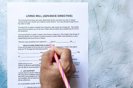 Filling Living Will Advance Directive form. Top viewの写真素材