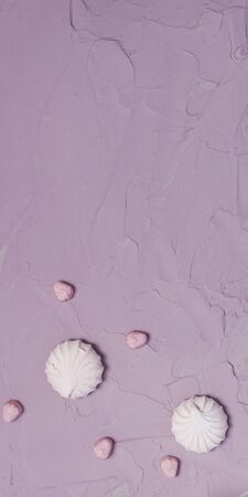 Marshmallows on pink background. Colorful marshmallow sweets with copy space. View from above or top viewの写真素材