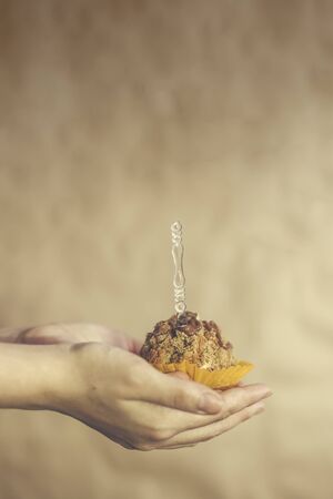 Woman hands holding tasty oat cookies. Healthy food.の写真素材