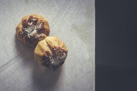 Two custard pastry cake on marble backgroundの写真素材