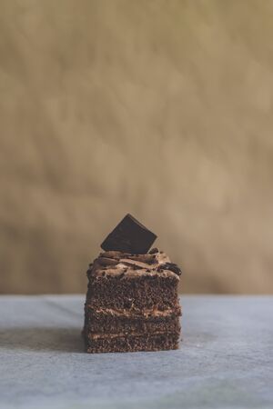 Hot coffee drink and sweet cake chocolate tart dessert pastry on mable backgroundの写真素材