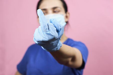 Woman showing middle finger hand gesture.の写真素材