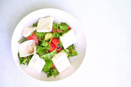 Health food concept. Fresh salad made with organic vegetables