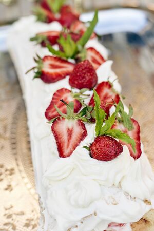 Freshly baked sweet strawberry Long-Cake Roll, also called Strawberry rouladeの写真素材