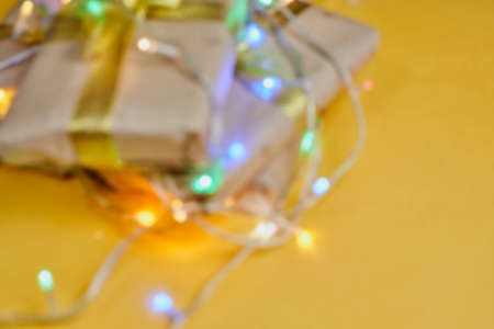 Blurred Christmas background. Defocused image for background usage. Christmas decorations and gift boxes. Gaussian blur filter appliedの写真素材