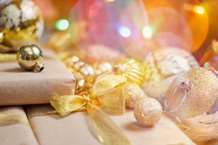 Christmas background. Close-up view of festive Christmas decorations and gift boxes. Celebrating...
