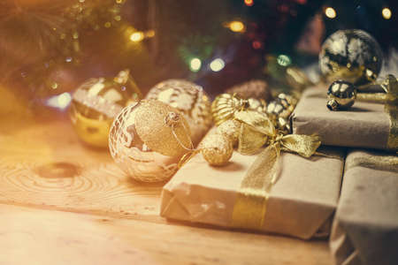 Christmas background. Close-up view of festive Christmas decorations and gift boxes. Celebrating Christmasの写真素材