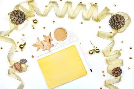 New year resolutions. Notepad with Christmas decorations. New year with new plansの写真素材