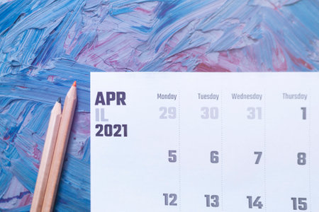 April 2021 calendar. April monthly calendar on blue backgroundの写真素材