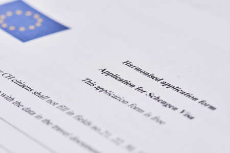 Tashkent, Uzbekistan - 13 August, 2021: Close-up shot of harmonized application form. Macro shot of application form for Schengen Visa for visiting European Unionのeditorial素材
