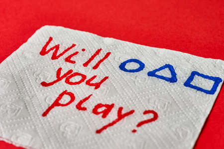 Tashkent, Uzbekistan - 22 October, 2021: Will you play squid game lettering on napkin.のeditorial素材