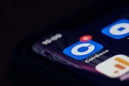 California, United States - 25 November 2021: Coinbase mobile application on smartphone screen desktop. Popular cryptocurrency exchange platform Coinbase mobile appのeditorial素材