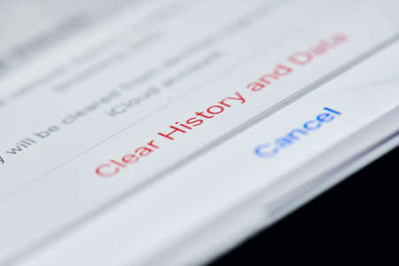 California, United States - 25 November 2021: Cleaning Safari internet browser history and cache data on iPhone. Safari remove history, cookies and other browsing dataのeditorial素材
