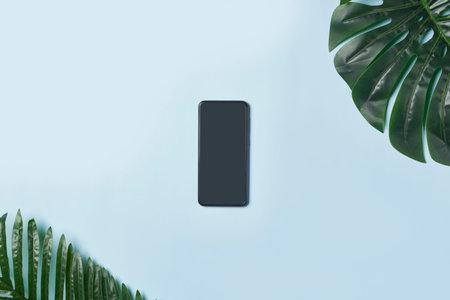 Bright office workspace. Work space with notepad, keyboard, coffee and glasses. Work space table desk. Flat lay, top view, copy spaceの写真素材