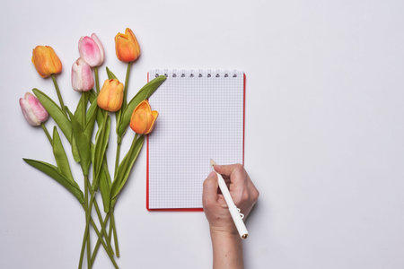 Happy easter time. Bright Easter holiday concept with spring flowers and easter eggs. Colorful...