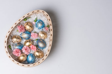 Happy easter time. Bright Easter holiday concept with spring flowers and easter eggs. Colorful...