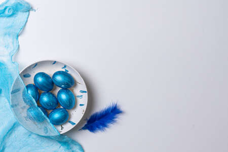 Happy easter time. Bright Easter holiday concept with spring flowers and easter eggs. Colorful Easter eggs backgroundの写真素材