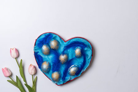 Happy easter time. Bright Easter holiday concept with spring flowers and easter eggs. Colorful...