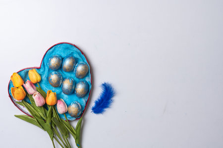 Happy easter time. Bright Easter holiday concept with spring flowers and easter eggs. Colorful...