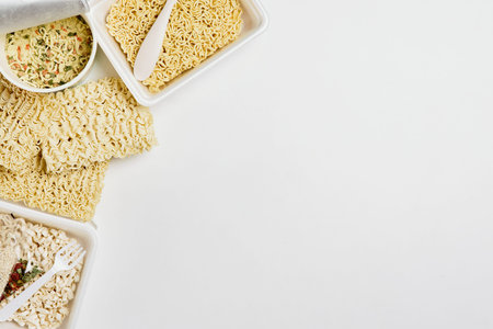 Instant noodles composition. Noodles on white backgroundの写真素材