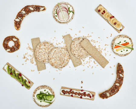 Healthy snacks. Fresh fruits, vegetables, cheese cream and nuts. Copy spaceの写真素材