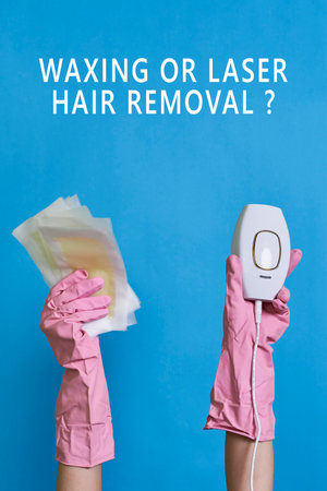 someones hands in pink rubber gloves with the words waxing or laser removal on top and bottomの写真素材