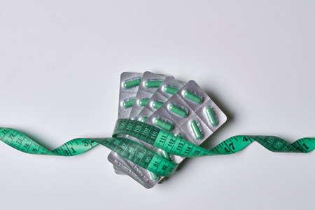 a green and white tape wrapped around a piece of tape that has been cut in half to show how its goingの写真素材