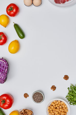 various fruits and vegetables arranged in the shape of a circle on a white background with space for text or imageの写真素材