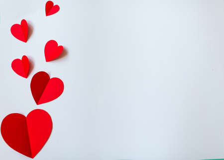 Creative paper hearts. Red paper heart isolated on white background with copy spaceの写真素材