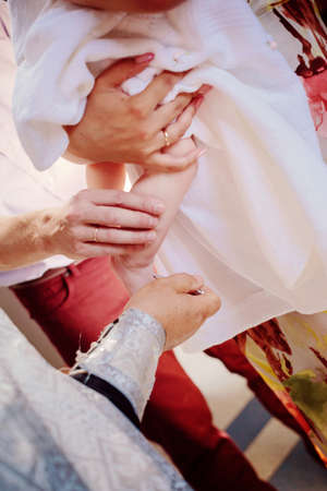 Accessories for Christening. Interior Of Orthodox Church In Easter. baby christening. Ceremony a in Christian . bathing the into the baptismal font
の写真素材