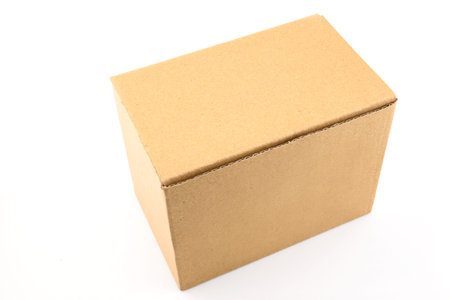 Brown cardboard box isolated on white background. Clipping path included.