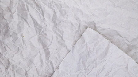 Crumpled paper background. White crumpled paper texture.の写真素材