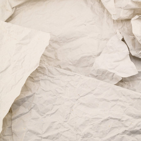 Crumpled paper background. White crumpled paper texture.