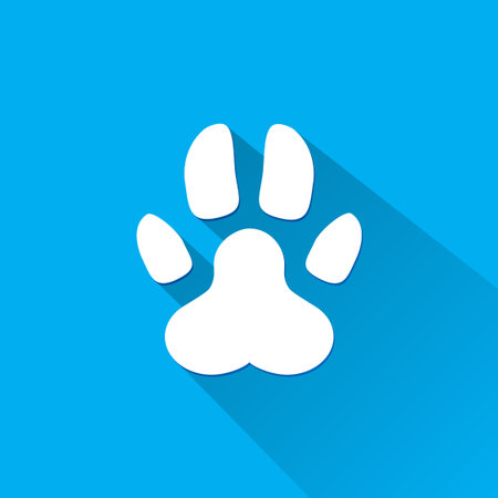 Flat dog paw silhouette with shadow. Vectorのイラスト素材