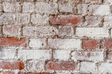 cracked concrete vintage brick wall background red and whiteの写真素材