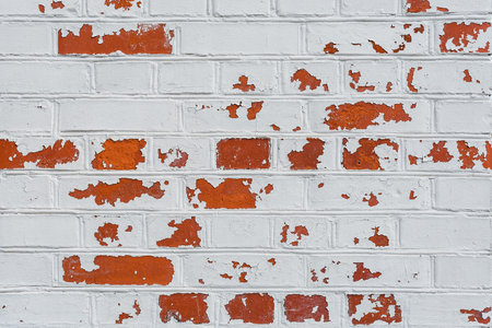 cracked concrete vintage brick wall background red and whiteの写真素材