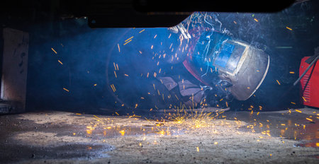 Welder in the working process