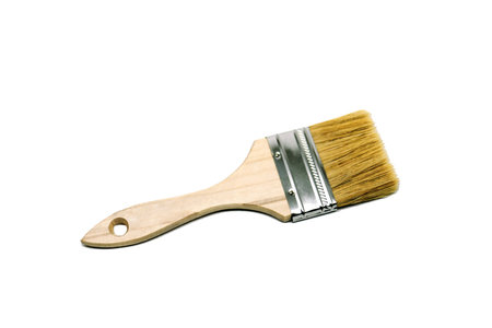 Wooden paint brush on white