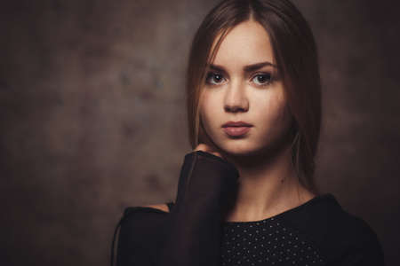The thoughtful beautiful woman attentively looks.の写真素材