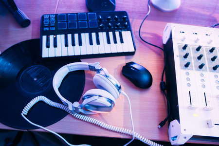 Audio production in sound studio with musical equipment. DJ's musical staffの写真素材