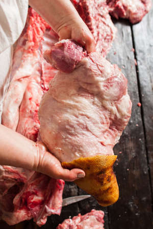 Meat retail of pork leg in farm market. Meat retail in local market.  Top view of pork leg in  butcheryの写真素材