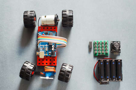 Handmade rc car model, construction on electronic. Little homemade truck for rally with remote control, prototype of automobile toy for adults. Modern technologies in playthings.の写真素材