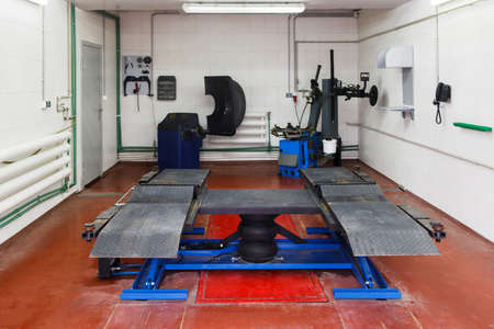 Vehicle washing overhead structure at carwash. Special equipment for auto washing at professional service stationの写真素材