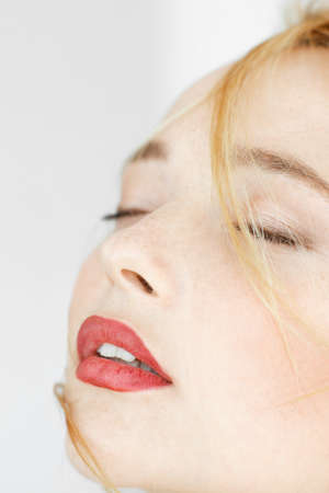 Close-up photo of woman feeling ecstasy. Seduction, satisfaction, orgasm, sexual arousal conceptの写真素材