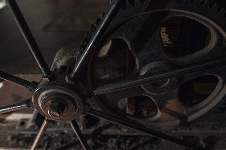 Old rusty metal gear, close-up. Important part of mechanism, historical exhibit of handle industrial equipment.の写真素材