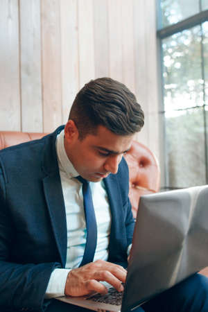 Man searching for information online. Research work, business, networking conceptの写真素材