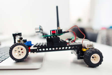 Handmade rc car from children construction, side view. Diy toy, electronics development, hobby conceptの写真素材
