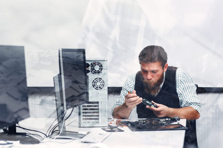 Disk-drive components fixing, double exposure. Repairman disassembling cd-rom of computer unit. Electronic repair, development, construction conceptの写真素材