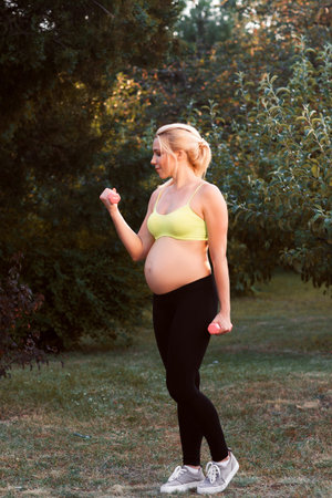 Pregnant Fitness Health Sport Body Care Leisure Conceptの写真素材