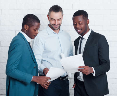 Getting certificates after successful training. Happy team in the office.の写真素材